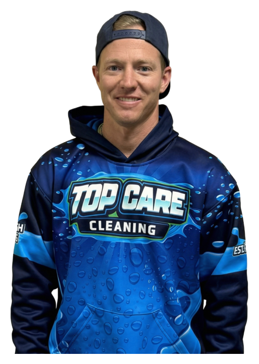 Alex Host wearing a Top Care Cleaning jersey